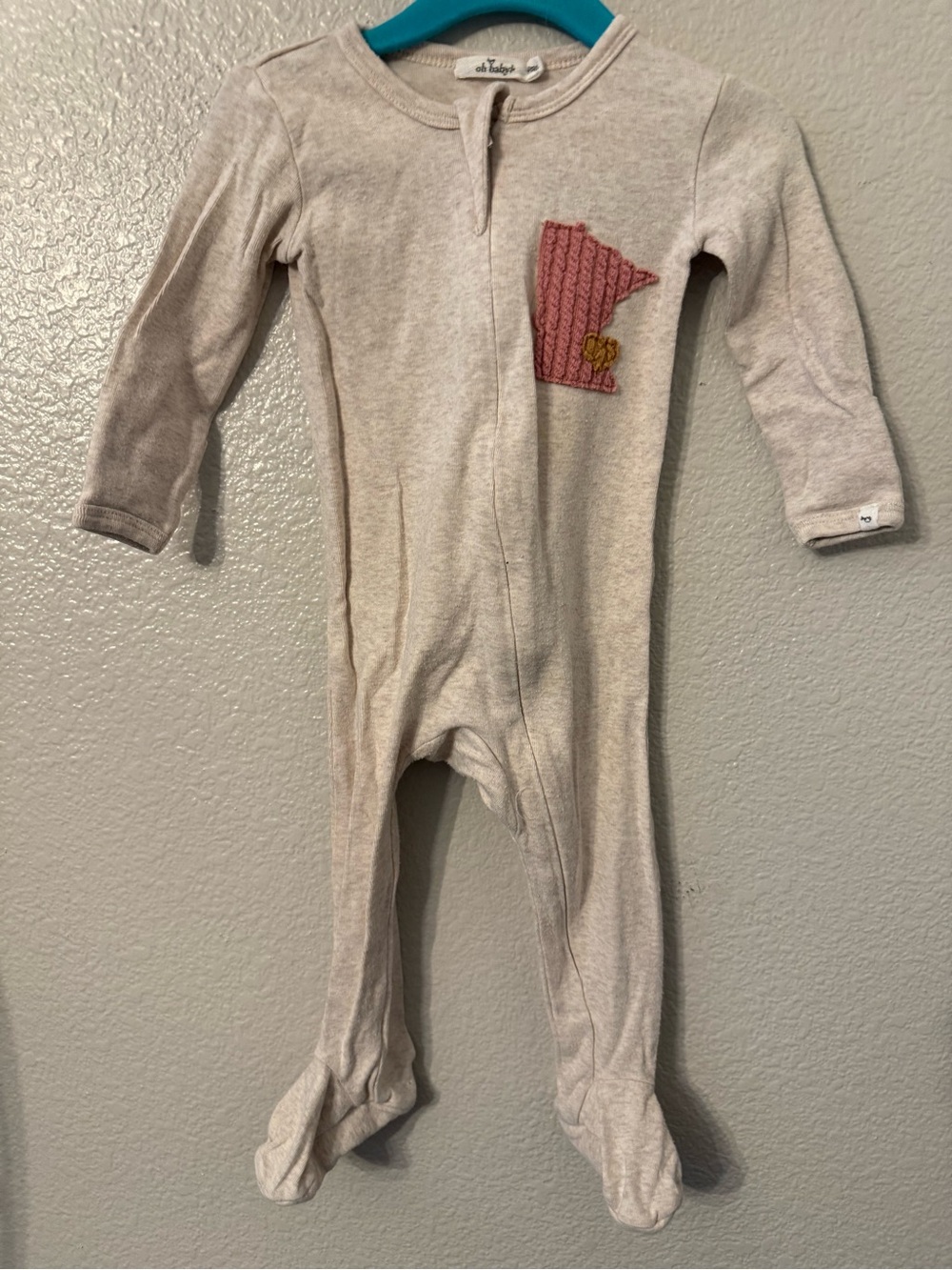 Neutral Cream Footed One-Piece with Pink Patch Detail